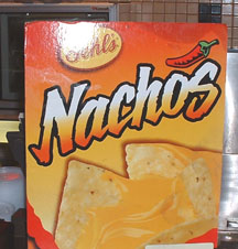 these nachos MIGHT have cheese on them