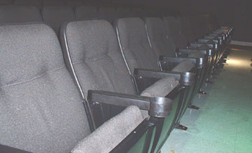 comfy movie seats with built-in drink holders WOW!